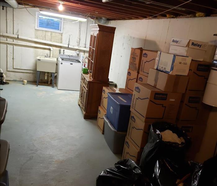 Basement with items neatly stored in boxes